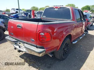 2002 Ford F-150 XLT with VIN 1FTRW07682KC33857, listed as a IAAI auction lot 41870137 with 185,480 mi miles. Bid and sale history available at carsss.com. Image 4.
