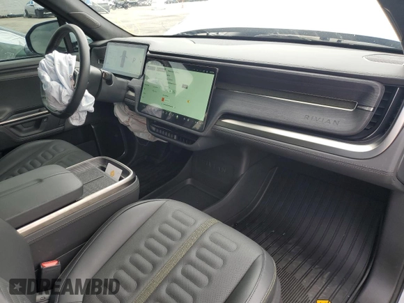 2025 Rivian R1S Adventure z VIN 7PDSGBBA2SN052590, wystawiony jako Copart lot #48431075 z przebiegiem 11 065 mil mil oraz Szkody całkowita. Historia ofert i sprzedaży dostępna na DreamBid. Obrazek 8.