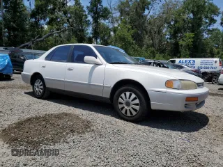 1995 Toyota Camry LE with VIN 4T1SK12E4SU878765, listed as a Copart auction lot 57761385 with 181,674 mi miles and Clean title. Bid and sale history available at DreamBid. Image 4.