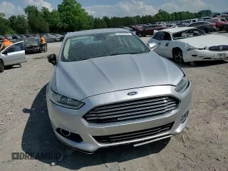 2013 Ford Fusion SE Hybrid z VIN 3FA6P0LU3DR336838, wystawiony jako Copart lot #56205445 z przebiegiem 209 164 mil mil oraz Czysty tytuł • Clean title. Historia ofert i sprzedaży dostępna na DreamBid. Obrazek 13.