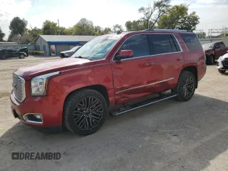 2015 GMC Yukon Denali with VIN 1GKS2CKJ6FR136152, listed as a Copart auction lot 76967664 with 137,208 mi miles and Salvage Title. Bid and sale history available at carsss.com. Image 1.
