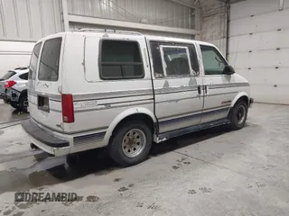 1994 Chevrolet Astro Cargo z VIN 1GBDM19Z0RB167297, wystawiony jako IAAI lot #42305621 z przebiegiem 154 683 mil mil oraz . Historia ofert i sprzedaży dostępna na DreamBid. Obrazek 4.