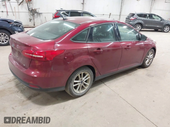 2015 Ford Focus SE with VIN 1FADP3F21FL270827, listed as a IAAI auction lot 42665015 with 162,745 mi miles and . Bid and sale history available at DreamBid. Image 4.
