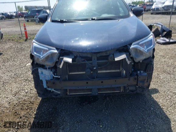 2018 Toyota RAV4 Hybrid SE with VIN JTMJJREV9JD191552, listed as a IAAI auction lot 42158665 with 84,025 mi miles and . Bid and sale history available at DreamBid. Image 12.