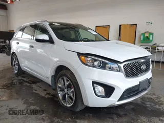 2016 Kia Sorento SX z VIN 5XYPKDA57GG040235, wystawiony jako IAAI lot #42332170 z przebiegiem 39 219 mil mil oraz . Historia ofert i sprzedaży dostępna na DreamBid. Obrazek 1.