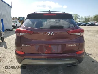 2016 Hyundai Tucson Limited z VIN KM8J33A24GU024457, wystawiony jako Copart lot #52284885 z przebiegiem 131 402 mil mil oraz Tytuł czysty. Historia ofert i sprzedaży dostępna na DreamBid. Obrazek 6.