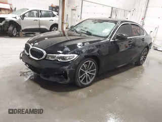 2021 BMW 3 Series 330i with VIN 3MW5R1J04M8B69186, listed as a IAAI auction lot 41576590 with 1 mi miles. Bid and sale history available at carsss.com. Image 2.