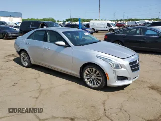 2014 Cadillac CTS Luxury AWD z VIN 1G6AX5S30E0155761, wystawiony jako Copart lot #59227295 z przebiegiem 139 813 mil mil oraz Tytuł czysty. Historia ofert i sprzedaży dostępna na DreamBid. Obrazek 4.