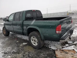 2002 Dodge Dakota SLT с VIN 1B7HG48N12S614309, выставлен на аукционе Copart как лот 87309554 с пробегом 287 994 миль миль и Списание • Salvage title. История ставок и продаж доступна на DreamBid. Изображение 2.