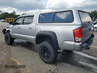 2016 Toyota Tacoma SR5 with VIN 5TFAX5GN3GX073301, listed as a Copart auction lot 71953054 with 148,396 mi miles and Salvage Title. Bid and sale history available at carsss.com. Image 2.