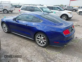 2015 Ford Mustang EcoBoost with VIN 1FA6P8TH5F5355429, listed as a IAAI auction lot 42273463 with 172,065 mi miles and . Bid and sale history available at DreamBid. Image 3.