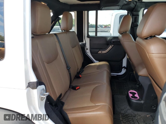 2016 Jeep Wrangler Unlimited Sahara with VIN 1C4BJWEG1GL328101, listed as a Copart auction lot 52754865 with 65,106 mi miles and Salvage title. Bid and sale history available at DreamBid. Image 10.