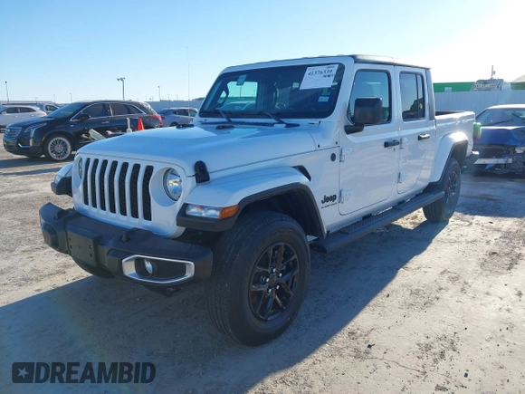 2023 Jeep Gladiator Willys z VIN 1C6HJTAGXPL528674, wystawiony jako IAAI lot #41376339 z przebiegiem 7 102 mil mil oraz . Historia ofert i sprzedaży dostępna na DreamBid. Obrazek 17.