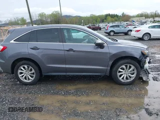 2018 Acura RDX Technology with VIN 5J8TB4H51JL010679, listed as a IAAI auction lot 41973440 with 97,643 mi miles and . Bid and sale history available at carsss.com. Image 14.