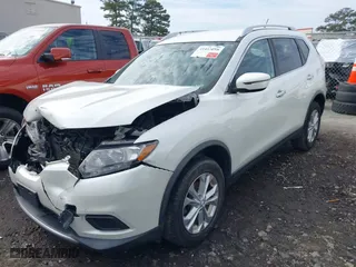 2016 Nissan Rogue S with VIN KNMAT2MV6GP699519, listed as a IAAI auction lot 41453258 with 166,581 mi miles. Bid and sale history available at carsss.com. Image 16.