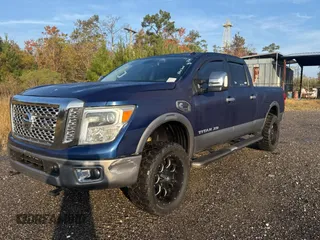 2016 Nissan Titan XD Platinum Reserve with VIN 1N6BA1F25GN500038, listed as a Copart auction lot 84605344 with 205,859 mi miles and Salvage Title. Bid and sale history available at carsss.com. Image 2.
