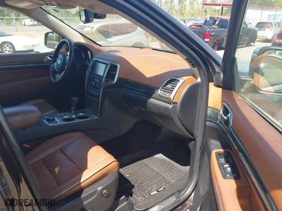 2011 Jeep Grand Cherokee Overland with VIN 1J4RR6GT1BC647292, listed as a IAAI auction lot 42069742 with 199,340 mi miles. Bid and sale history available at carsss.com. Image 5.