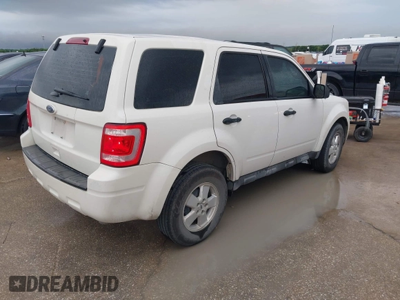 2012 Ford Escape XLS with VIN 1FMCU9C79CKA78649, listed as a IAAI auction lot 42160140 with 211,880 mi miles and . Bid and sale history available at DreamBid. Image 4.