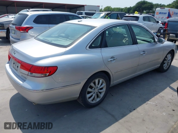 2007 Hyundai Azera SE z VIN KMHFC46F67A213796, wystawiony jako IAAI lot #42276751 z przebiegiem 139 200 mil mil oraz . Historia ofert i sprzedaży dostępna na DreamBid. Obrazek 4.