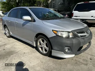 2011 Toyota Corolla L with VIN 2T1BU4EE5BC707015, listed as a IAAI auction lot 42031097 with 182,586 mi miles. Bid and sale history available at carsss.com. Image 1.