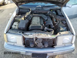 1993 Mercedes-Benz E Class with VIN WDBEA32E9PB936886, listed as a Copart auction lot 86800894 with 115,217 mi miles and Salvage Title. Bid and sale history available at carsss.com. Image 11.