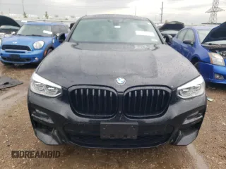 2021 BMW X4 M40i with VIN 5UX2V5C00M9H95699, listed as a Copart auction lot 63564433 with 33,500 mi miles and Salvage title. Bid and sale history available at DreamBid. Image 5.