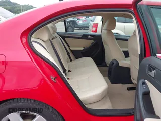 2014 Volkswagen Jetta TDI w/Premium/Nav with VIN 3VWLL7AJ4EM383351, listed as a IAAI auction lot 42424074 with 66,824 mi miles and . Bid and sale history available at DreamBid. Image 8.