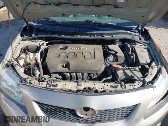 2009 Toyota Corolla with VIN 2T1BU40E59C163293, listed as a IAAI auction lot 41824986 with 123,954 mi miles. Bid and sale history available at carsss.com. Image 10.