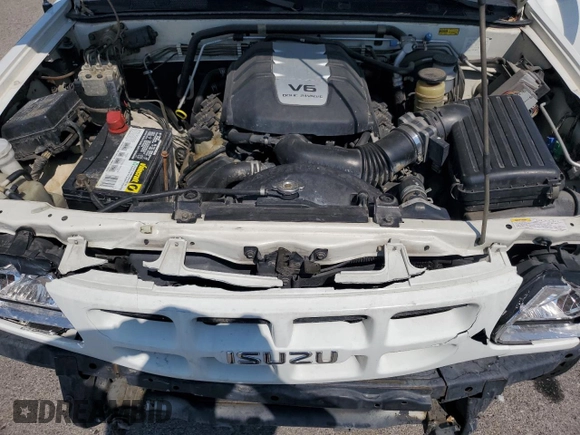 2000 Isuzu Rodeo S with VIN 4S2DM58WXY4302769, listed as a Copart auction lot 70416054 with 150,621 mi miles and Salvage Title. Bid and sale history available at DreamBid. Image 11.