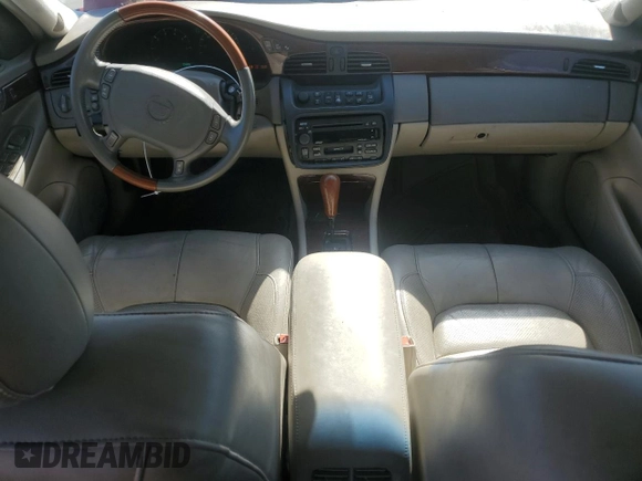 2002 Cadillac DeVille DTS with VIN 1G6KF57942U231877, listed as a Copart auction lot 76724554 with 180,082 mi miles and Salvage Title. Bid and sale history available at carsss.com. Image 8.