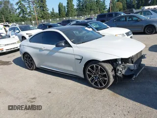 2015 BMW M4 with VIN WBS3R9C59FK332216, listed as a IAAI auction lot 42761675 with 56,566 mi miles and . Bid and sale history available at DreamBid. Image 1.