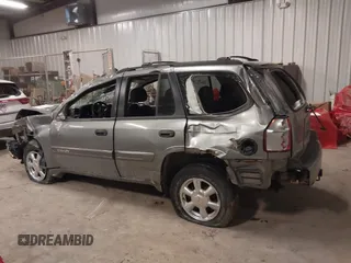 2005 GMC Envoy SLT with VIN 1GKDT13S352257892, listed as a IAAI auction lot 41690880 with 134,216 mi miles. Bid and sale history available at carsss.com. Image 14.