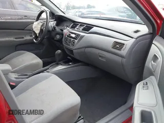 2006 Mitsubishi Lancer ES with VIN JA3AJ26E16U035856, listed as a IAAI auction lot 41533062 with 161,482 mi miles. Bid and sale history available at carsss.com. Image 5.