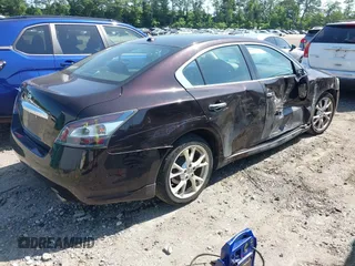 2014 Nissan Maxima S with VIN 1N4AA5AP5EC480297, listed as a IAAI auction lot 42572233 with 79,101 mi miles and . Bid and sale history available at DreamBid. Image 4.