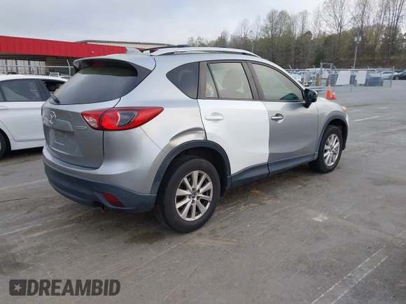 2013 Mazda CX-5 Touring with VIN JM3KE2CE0D0105115, listed as a IAAI auction lot 41899956 with 301,264 mi miles. Bid and sale history available at carsss.com. Image 4.