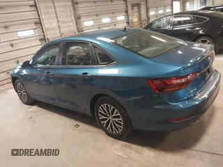 2019 Volkswagen Jetta SEL z VIN 3VWE57BU2KM116717, wystawiony jako IAAI lot #41951428 z przebiegiem 85 791 mil mil oraz . Historia ofert i sprzedaży dostępna na DreamBid. Obrazek 14.