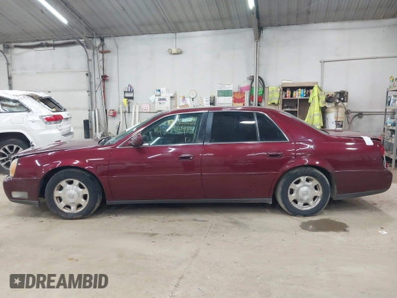 2002 Cadillac DeVille with VIN 1G6KD54Y12U214732, listed as a IAAI auction lot 42018412 with 139,474 mi miles. Bid and sale history available at carsss.com. Image 14.