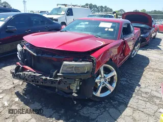 2014 Chevrolet Camaro LT z VIN 2G1FC1E38E9242518, wystawiony jako IAAI lot #41988618 z przebiegiem 90 993 mil mil oraz . Historia ofert i sprzedaży dostępna na DreamBid. Obrazek 19.