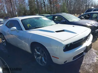 2015 Dodge Challenger SXT Plus with VIN 2C3CDZBG9FH811580, listed as a IAAI auction lot 41813822 with 134,997 mi miles. Bid and sale history available at carsss.com. Image 1.