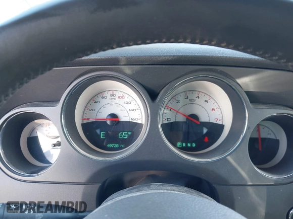 2014 Dodge Challenger R/T z VIN 2C3CDYBT7EH293104, wystawiony jako IAAI lot #41452435 z przebiegiem 49 728 mil mil oraz . Historia ofert i sprzedaży dostępna na DreamBid. Obrazek 7.