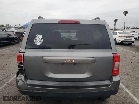 2014 Jeep Patriot Altitude with VIN 1C4NJPBAXED595327, listed as a Copart auction lot 53665005 with 134,771 mi miles and Salvage Title. Bid and sale history available at DreamBid. Image 6.