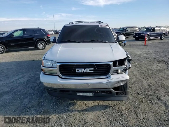 2005 GMC Yukon SLT z VIN 1GKEC13T75R205508, wystawiony jako Copart lot #87511845 z przebiegiem 179 749 mil mil oraz Szkoda całkowita • Salvage title. Historia ofert i sprzedaży dostępna na DreamBid. Obrazek 12.