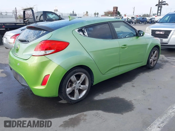 2012 Hyundai Veloster w/Gray Int z VIN KMHTC6AD3CU025315, wystawiony jako IAAI lot #42097741 z przebiegiem 146 726 mil mil oraz . Historia ofert i sprzedaży dostępna na DreamBid. Obrazek 4.