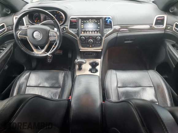 2014 Jeep Grand Cherokee Overland with VIN 1C4RJFCG1EC587458, listed as a Copart auction lot 50213015 with 124,266 mi miles and Salvage Title. Bid and sale history available at carsss.com. Image 8.