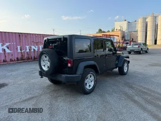 2015 Jeep Wrangler Unlimited Sport with VIN 1C4BJWDG8FL502570, listed as a Copart auction lot 65854505 with 120,541 mi miles and Clean title. Bid and sale history available at DreamBid. Image 4.