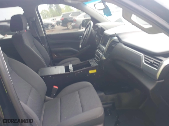 2019 Chevrolet Tahoe Commercial with VIN 1GNLCDECXKR208052, listed as a IAAI auction lot 42014348 with 96,455 mi miles. Bid and sale history available at carsss.com. Image 5.
