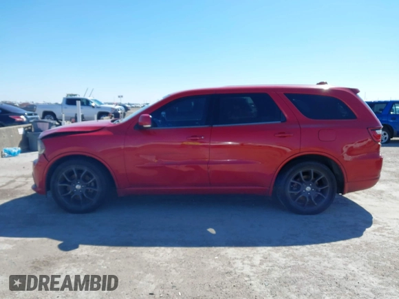 2016 Dodge Durango R/T with VIN 1C4SDHCT7GC402737, listed as a IAAI auction lot 41629418 with 206,557 mi miles and . Bid and sale history available at DreamBid. Image 14.