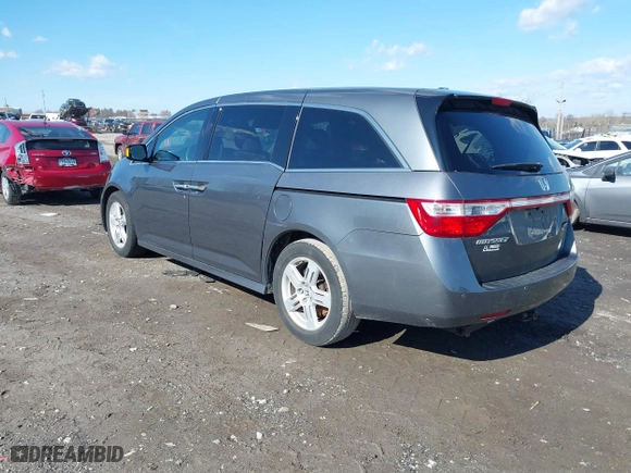 2013 Honda Odyssey Touring with VIN 5FNRL5H97DB018839, listed as a IAAI auction lot 41884016 with 171,650 mi miles. Bid and sale history available at carsss.com. Image 3.