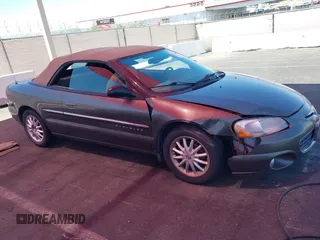 2001 Chrysler Sebring LXi z VIN 1C3EL55U61N638770, wystawiony jako IAAI lot #42228671 z przebiegiem 87 579 mil mil oraz . Historia ofert i sprzedaży dostępna na DreamBid. Obrazek 12.