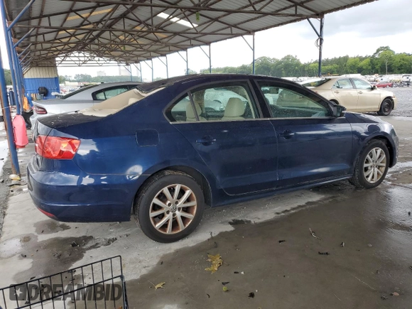2013 Volkswagen Jetta SE with VIN 3VWDP7AJXDM379392, listed as a Copart auction lot 61598235 with 119,005 mi miles and Salvage title. Bid and sale history available at DreamBid. Image 3.